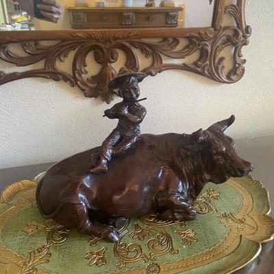 Metal Cow w/ boy on back.  This motif maybe from the Jugyuzu Zen teaching.