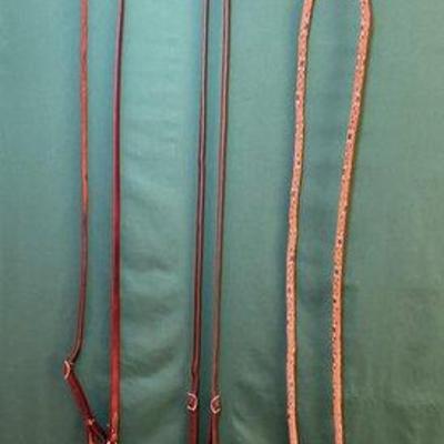 752 • three sets of roping reins, one martingale and one noseband
