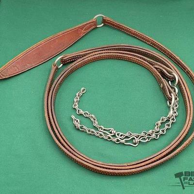 718 • dark leather romal rein set with slobber chains
