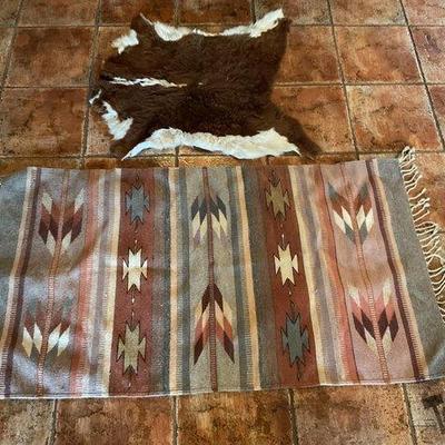 742 • hand woven blanket and small hide