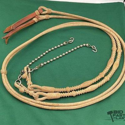 704 • braided rawhide split reins with slobber chains