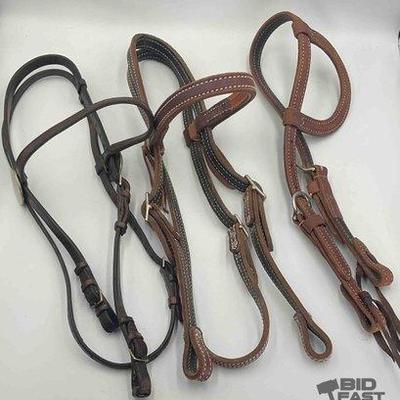 529 • three leather headstalls, one vintage and two new