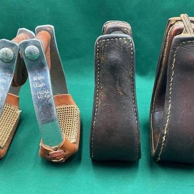 391 • two pair of western stirrups one walls roo hide and one leather