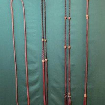 750 • three pair of leather reins and one leather over and under