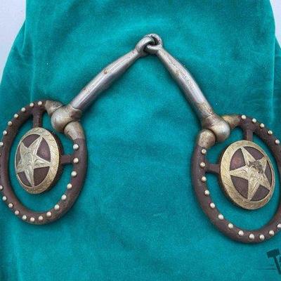 248 • ring snaffle with texas star conchos