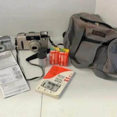 Canon Cameras Including Film And Carrying Case