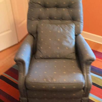 Upholstered Reclining Chair.