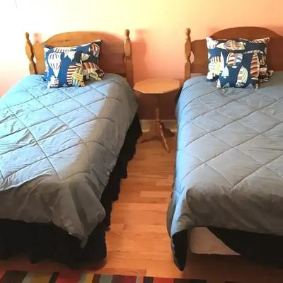 Pair Of Twin Beds With Side Table