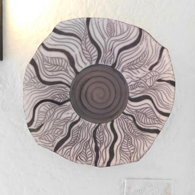 Pottery is all made by Susan or her husband Wally.