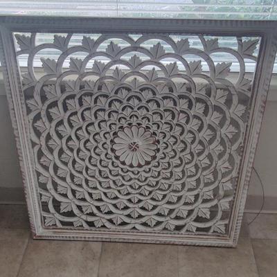 Mandala wall carving