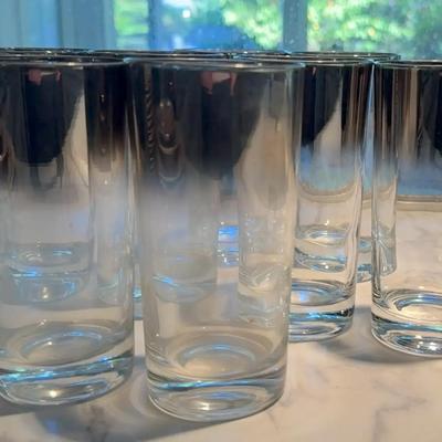 This vibrant vintage glass collection includes a beautiful mix of shapes and colors that bring mid-c