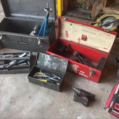 Power And Hand Tools In Metal Tool Boxes