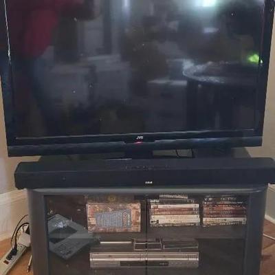 42" JVC TV W/ RCA Soundbar, TV Stand, Cd And Vhs Player And More