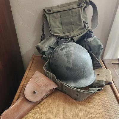 Vintage Military Gear: Satchels, Helmet And Leg Protection