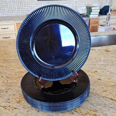 Lot #205 - Set of 12 Dark Blue Plastic Chargers.