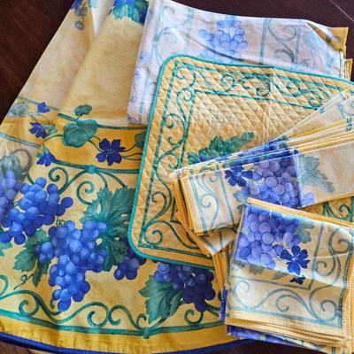 Lot #213 - Grapevine Tablecloths, Serving Mat & Napkins