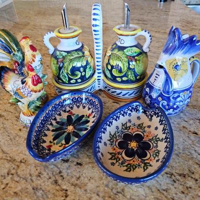 Lot #187 - Lot of Italian & Polish Pottery Serving Pieces for the Kitchen: Oil & Vinegar, Spoon Rests, Creamer, Salt/Pepper