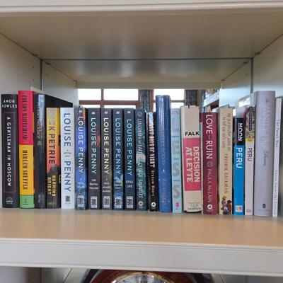 Lot #52 - Collection of Novels Including Louise Penny Series, Nick Petrie Thriller, and Various Fiction Titles