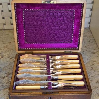 Lot #185 - Antique Silver-Plated Fish Cutlery Set With Bone Handles in Original Fitted Wooden Box.