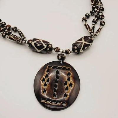 Carved and Dyed Bone Necklace with Silver Tone Accent Beads