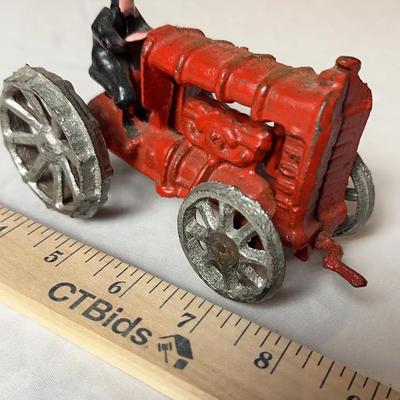 Vintage Cast Iron Ford Farm Tractor Toy with Driver – Circa 1930s-1950s 