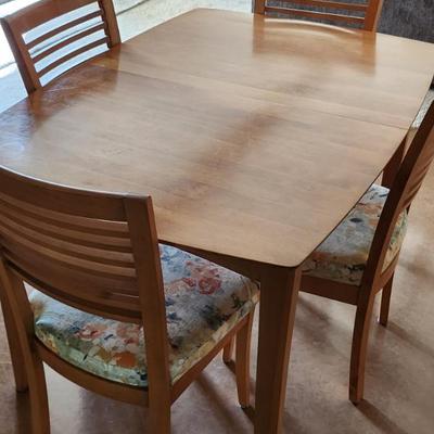 Table and four chairs leaf not pictured