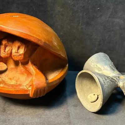 Oaxacan wedding bell and carved wooden guys in a shell