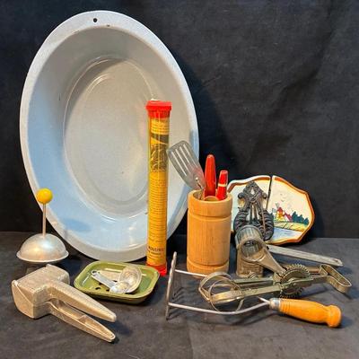 Vintage enamel basin and kitchen utensils