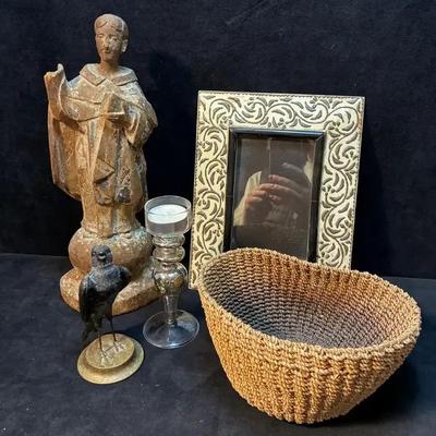 Carved wooden saint figure metal bird and more