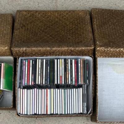 (3) Woven Rattan Lidded Nesting Baskets With Assorted CD's (as Is)