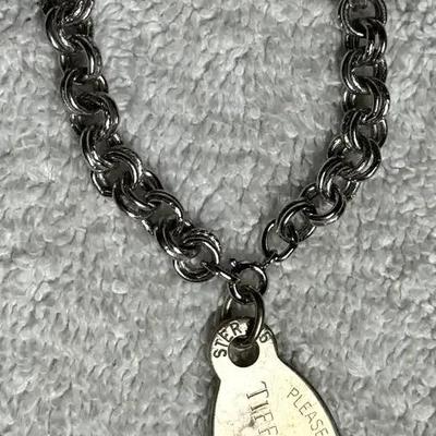 Tiffany co. "return to tiffany" oval tag