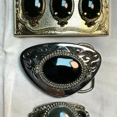 Three belt buckles