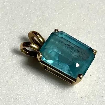 Small aquamarine set in 14k