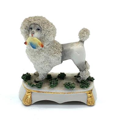 Sale Photo Thumbnail #17: Tiny antique Staffordshire  porcelain poodle.