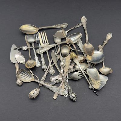 Sale Photo Thumbnail #41: Lots of ornate sterling forks, spoons and knives in this sale