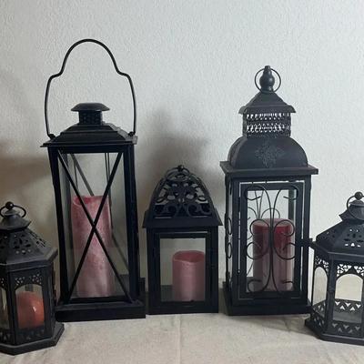Five Black Metal Lanterns (Some With Battery Operated Candles, And Others For Real Candles)
