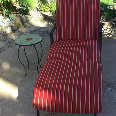 Red Striped Lounge Chair with Floral Glass Side Table