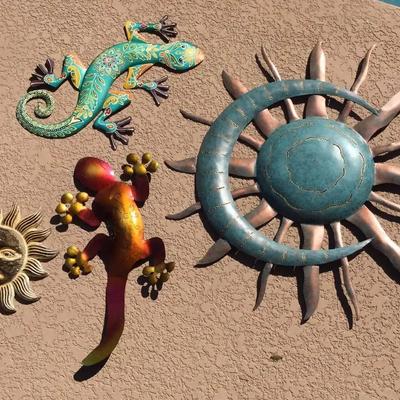 Two Beautiful Metal Suns And Two Vibrant Metal Wall Lizards