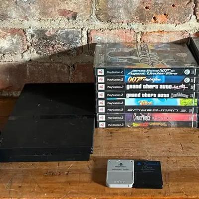 Playstation 2 and 17 PS2 Games with Controllers and Memory Cards