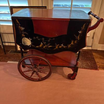 Handpainted tea cart on wheels with collapsable handle, glass tray and drawer.