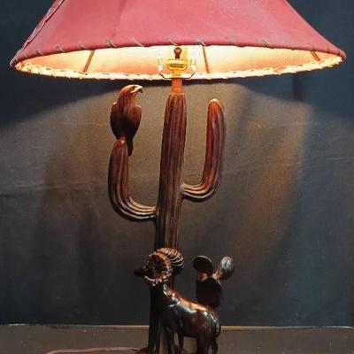 Hand-Carved Southwestern Desert Scene Lamp – Saguaro Cactus, Ram, and Eagle Motif with Rawhide Shade