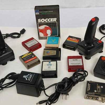 Vintage Atari games with gaming controllers.