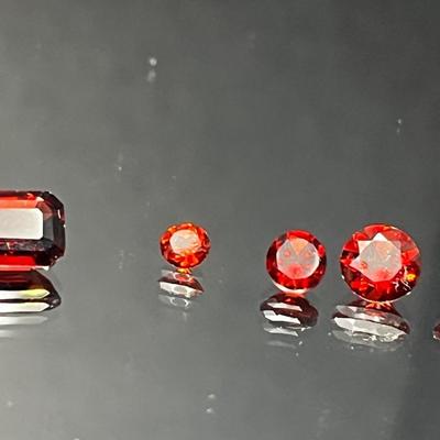 Garnet 1.80 CTTW - Emerald Cut 8x6mm and Rounds of Mixed Sizes