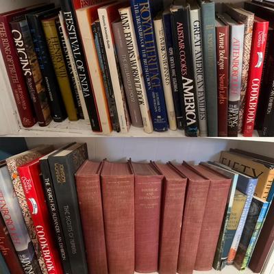 Personal Library Bookshelf Featuring History, Art, and Cultural Works