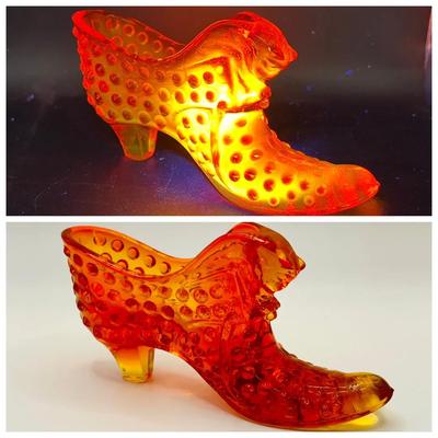 Cathead Hobnail Glass Shoe Glowing in Ultraviolet Light