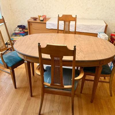 Table & (4) Cane Backed Chairs
