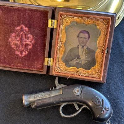 Antique daguerreotype, toy Pirates cap gun