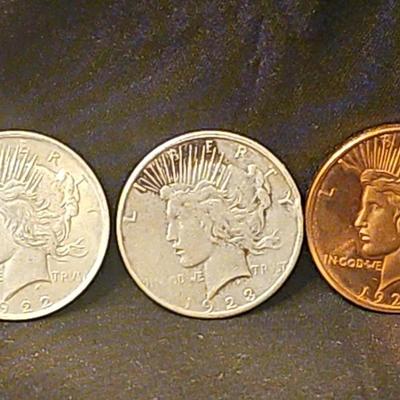 1922 & 1028  Silver Peace Dollars & 1 Copper Ounce Coin. 