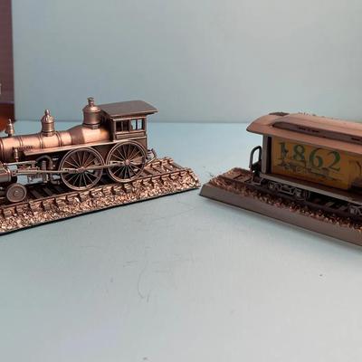 Pair Of Pewter Train Models