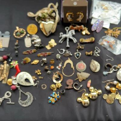 A Collection Of Earrings, Pins, Hair, Barrettes, Tie Clips And More